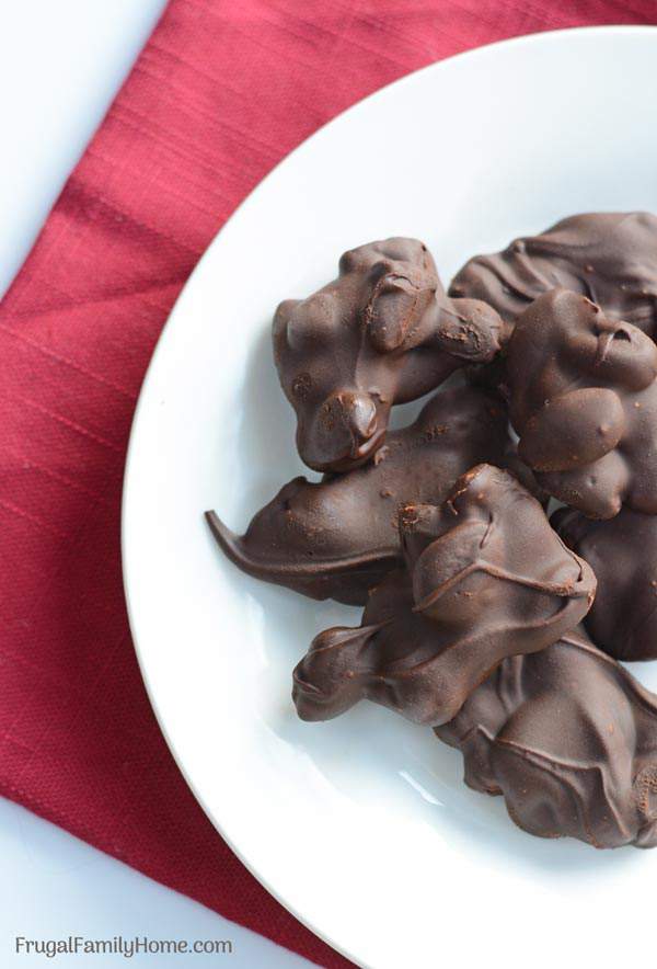 Make these amazingly easy chocolate almond clusters in just minutes. It’s a great dessert for the holidays or to give as gifts. They can be made with milk or dark chocolate. Homemade candy doesn’t get much easier than this.