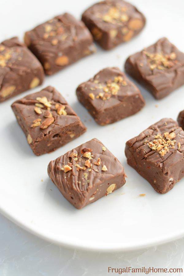 We love this quick and easy no bake chocolate fudge recipe. Make a batch and give it as a Christmas gift or enjoy it yourself. This 4 ingredient fudge turns our smooth and creamy it just melts in your mouth.