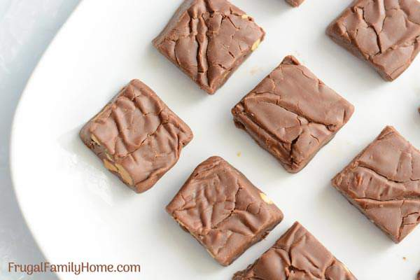 We love this quick and easy no bake chocolate fudge recipe. Make a batch and give it as a Christmas gift or enjoy it yourself. This 4 ingredient fudge turns our smooth and creamy it just melts in your mouth.