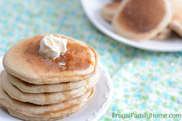 This whole wheat pancake recipe is easy to make and healthy too. It doesn’t contain eggs or oil. You can make it dairy free by using almond milk or another non dairy milk. It’s a great weekend breakfast but fast enough to be made on a weekday too. Even though these pancakes are made with whole wheat, they are light and fluffy. Come see what the secret is to making them fluffy instead of heavy and dense.