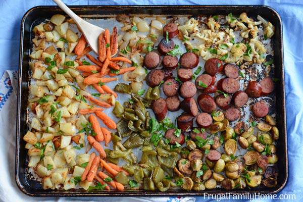 A super easy sausage and vegetable sheet pan dinner. Make your own combination of onions, Brussels sprouts, and potatoes roasted in the oven for a quick dinner. That’s easy to clean up too since it’s made in one pan.