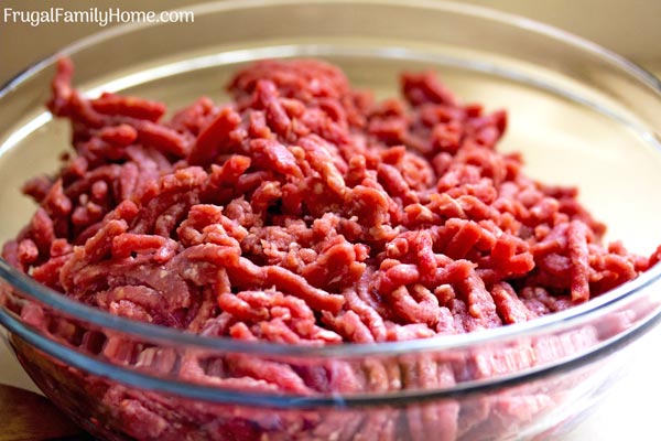 Ground beef in a bowl and tips for how to save on beef