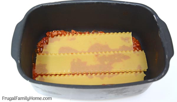 The first layer of noodles in the crock pot lasagna recipe.