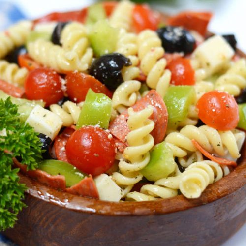 Italian pizza salad in a bowl ready to eat.