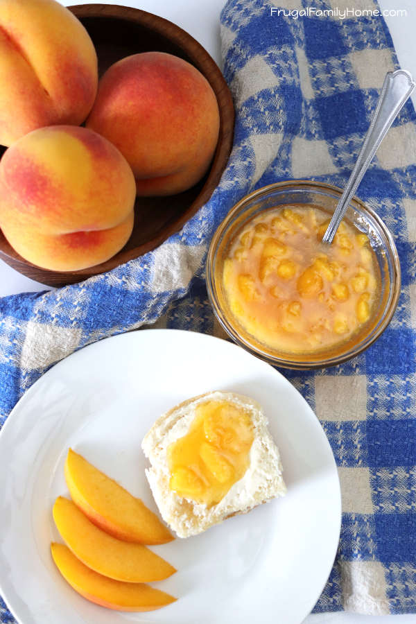 Serving the peach jam on a roll.