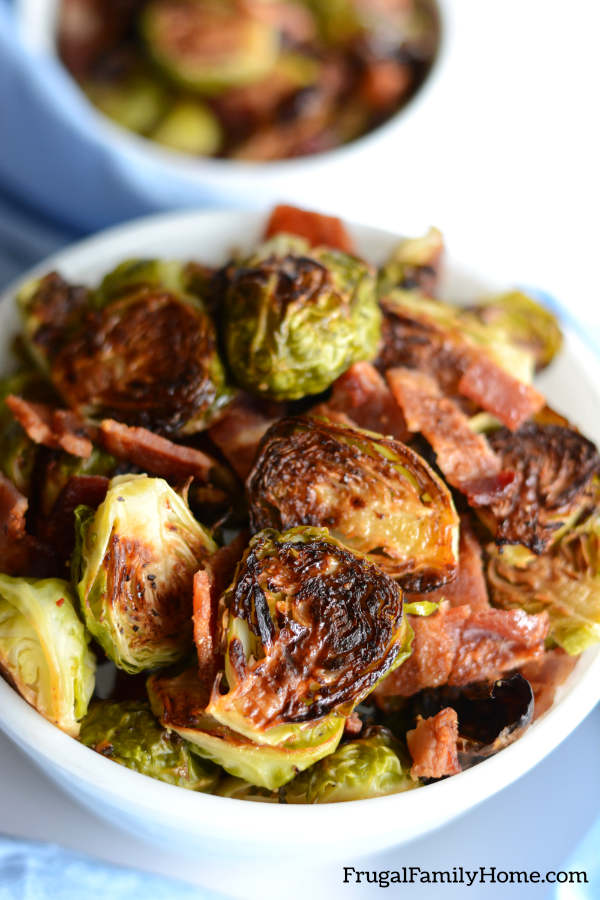 A bowl of brussel sprouts with bacon