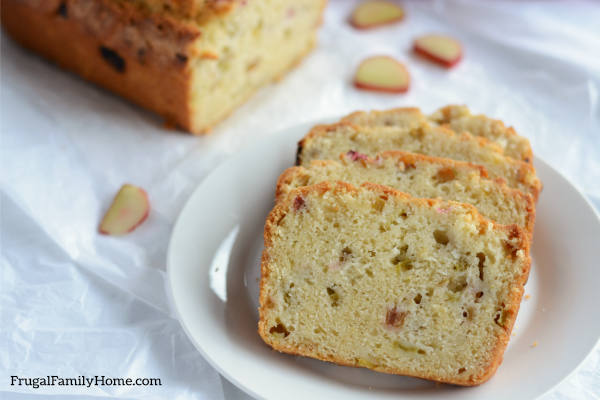 3 slices of homemade rhubarb bread on a plate