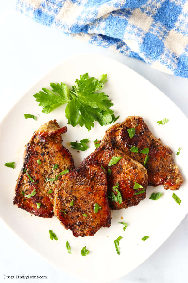 Easy crock pot pork chops recipe ready to serve.