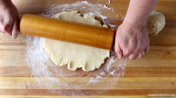 Rolling the pie crust for the raspberry pie