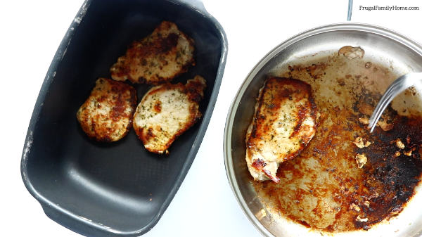 Transferring the pork chops into the slow cooker.