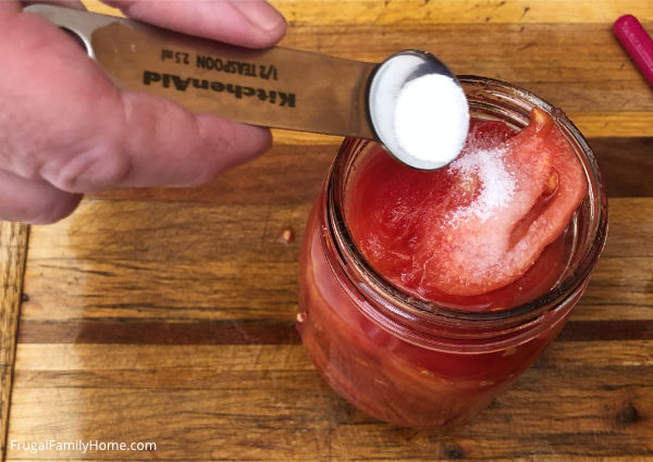 Adding the salt to home canned tomatoes