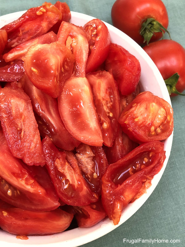 tomatoes prepared for water bath canning.