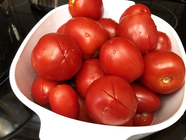 tomatoes scored with an x before canning.