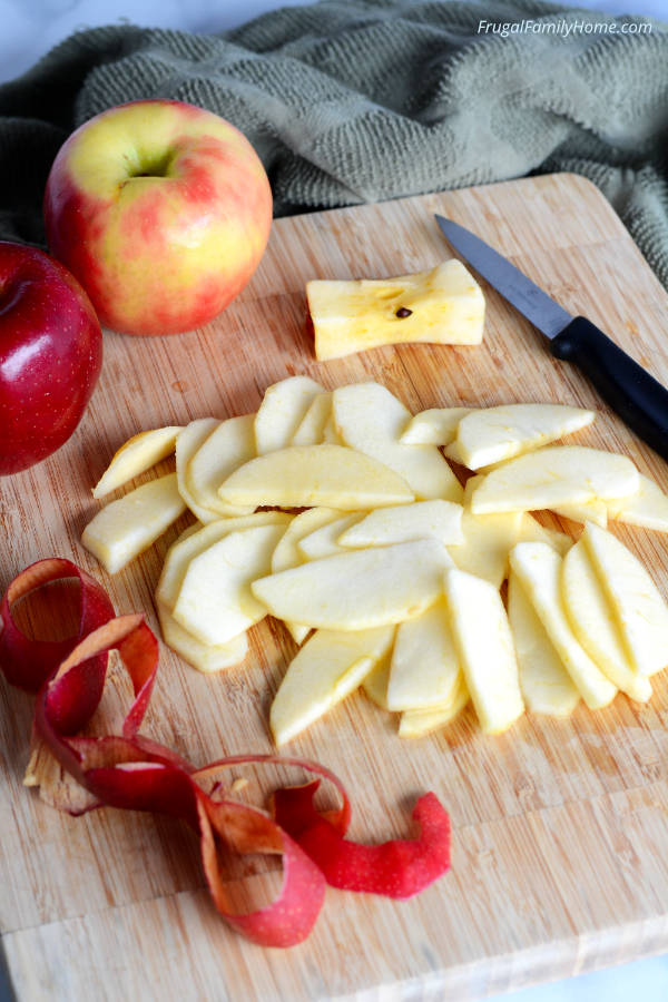The apples cored and sliced for apple pie