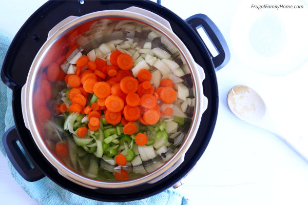 The vegetables sautéing for the instant pot soup.