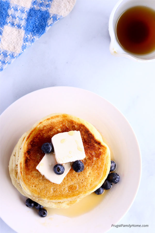 a serving of pancakes with homemade pancake syrup.