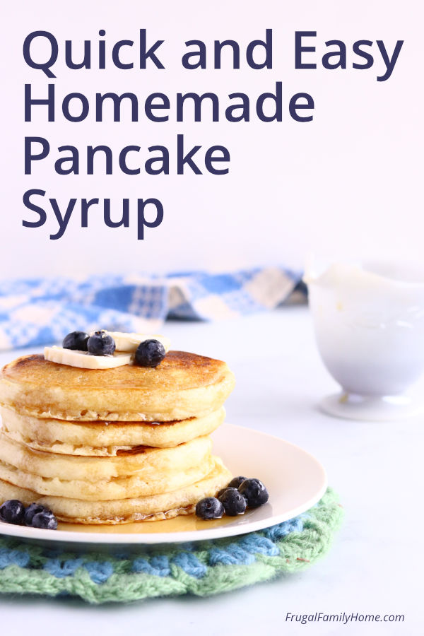 Homemade pancake syrup made with white sugar on top of pancakes.