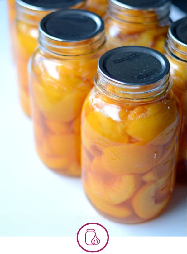 jars of canned peaches
