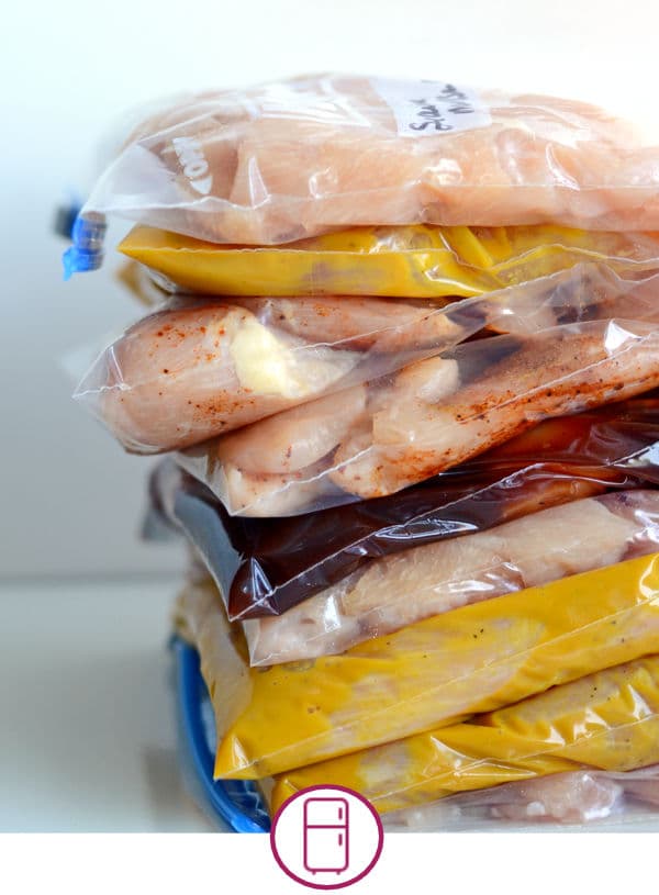 a stack of freezer bags filled with food