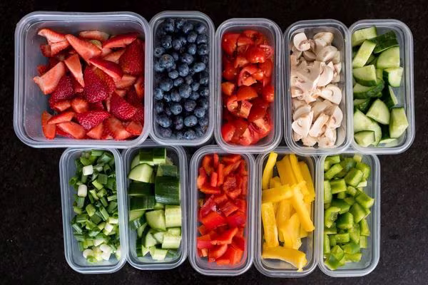 Fruits and vegetables prepped for meals.