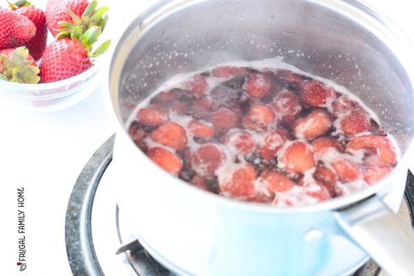 Simmering the strawberries for simple syrup